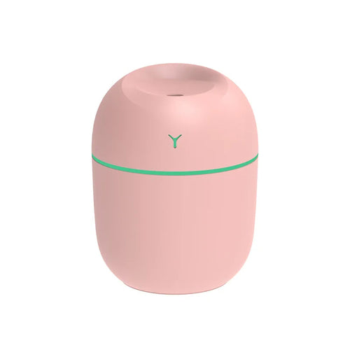 Portabler Mini-Aroma-Diffusor von BeachAndSteam mit LED-Licht und Ultraschall-Humidifier in Rosa, kompakt und vielseitig einsetzbar.