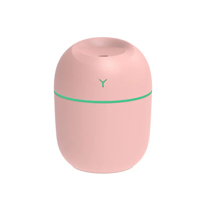 Portabler Mini-Aroma-Diffusor von BeachAndSteam mit LED-Licht und Ultraschall-Humidifier in Rosa, kompakt und vielseitig einsetzbar.